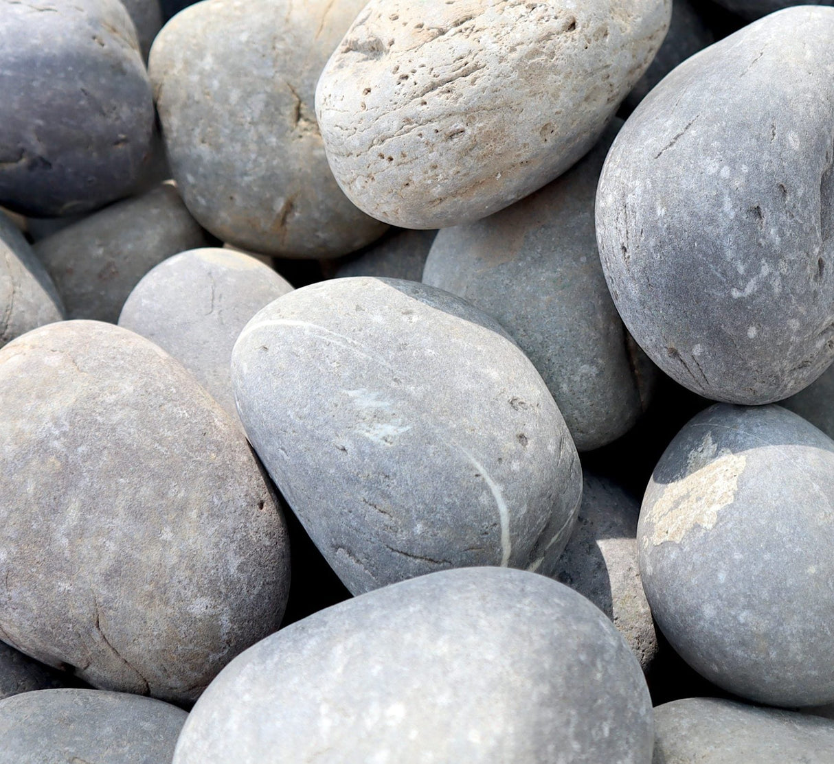 Gray River Pebbles "Natural Garden Material"