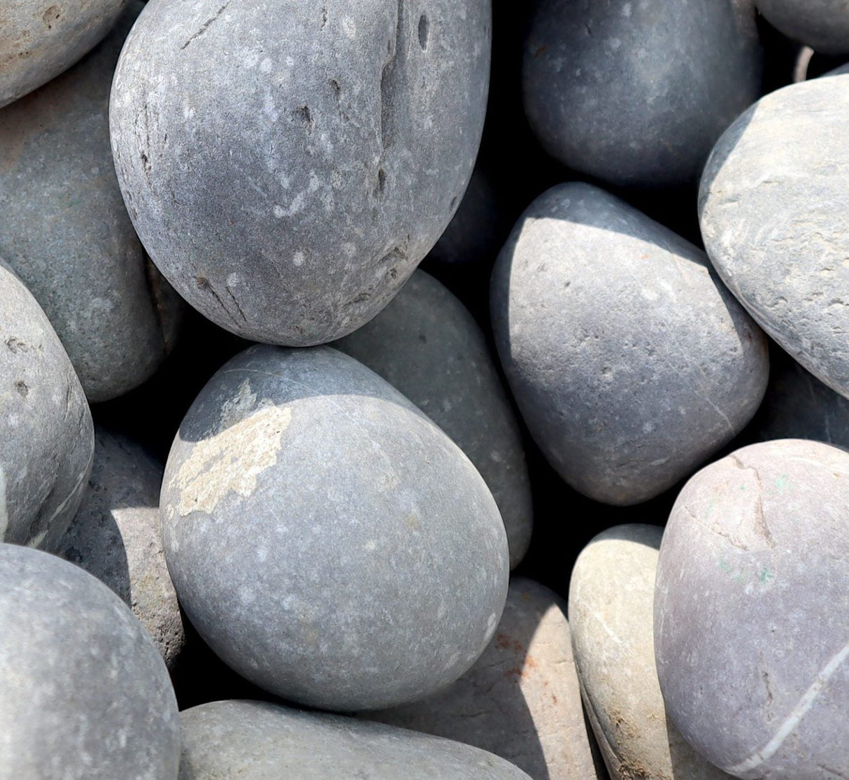 Gray River Pebbles "Natural Garden Material"